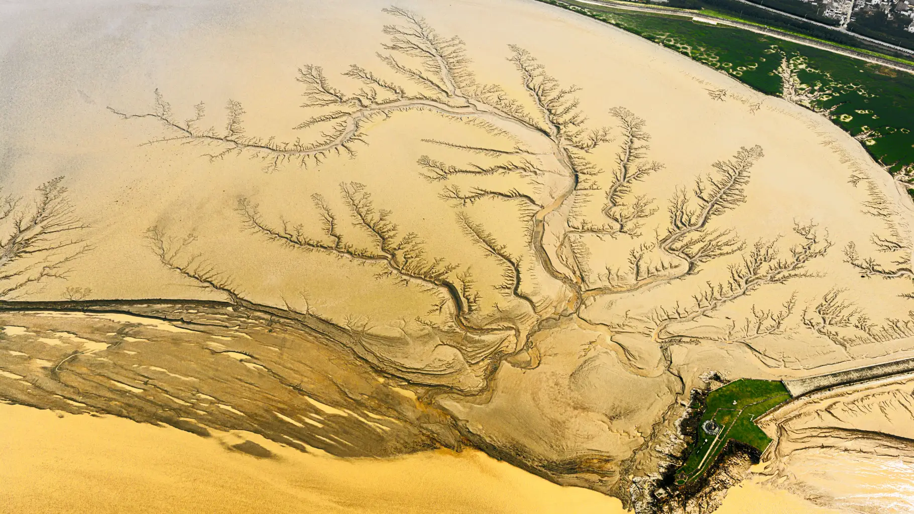 A winding river seen from the air at golden hour